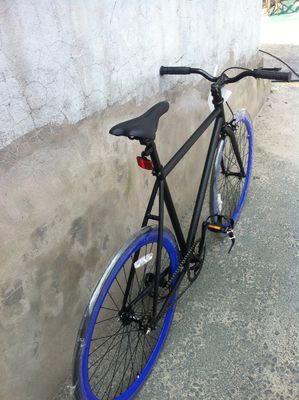 700C Bicicleta de engrenagem fixa com travão de calibre e estrutura de aço Hi-Ten Peças OEM EUA CE UL